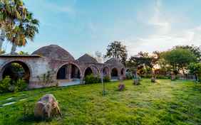 Die drei Green-Valley-Häuser liegen nur wenige Schritte vom Strand entfernt